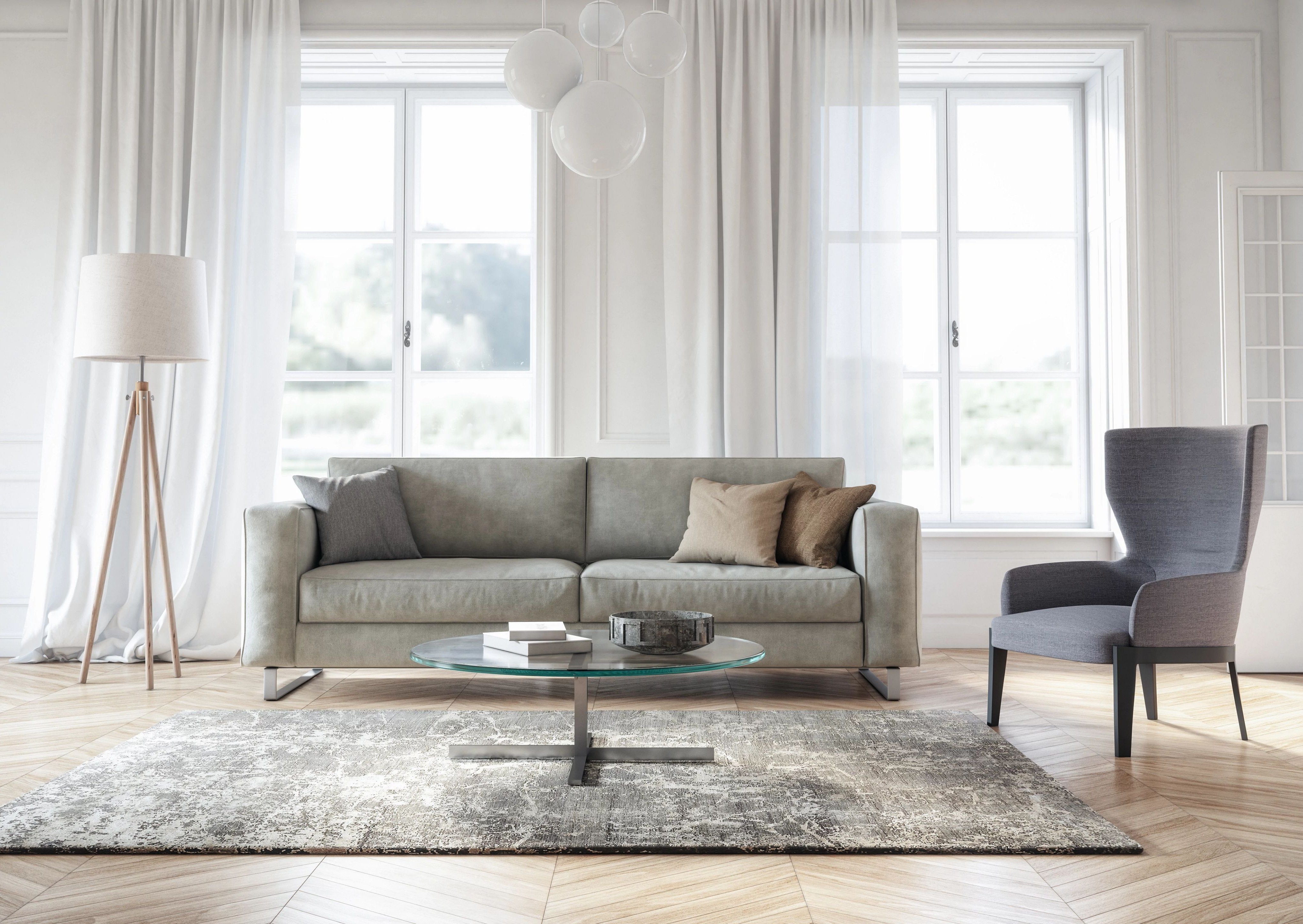 Bright modern living room with a gray couch and area rug, and large windows with white curtains - Window Treatments from C G Interiors in San Leandro, CA